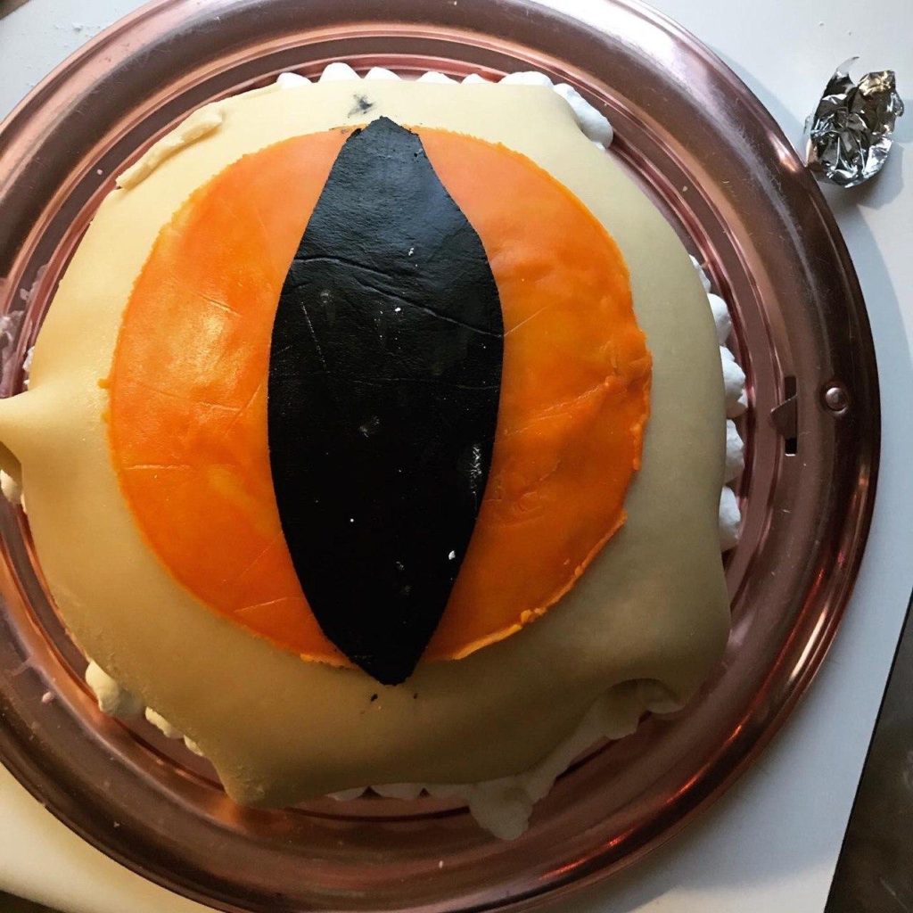 A dome-shaped cake that looks like a snake's eye.